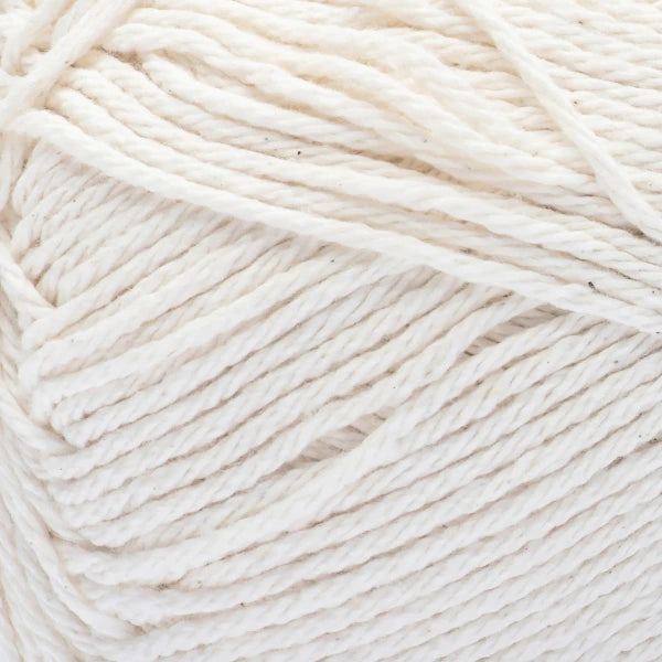 Close-up of a ball of off white yarn