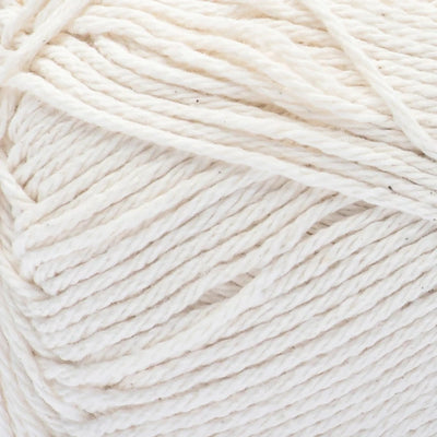 Close-up of a ball of off white yarn