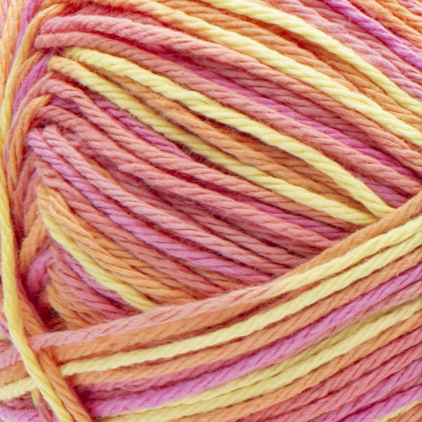 Close-up of multicolored yarn in pink, yellow, and orange.