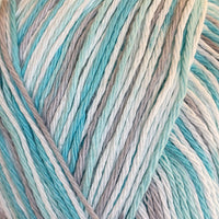 Close-up of variegated yarn in soft pastel shades of aqua, mint, cream, and light gray