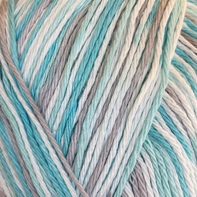 Close-up of variegated yarn in soft pastel shades of aqua, mint, cream, and light gray