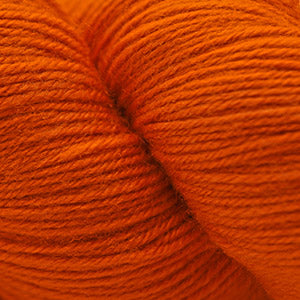 Close-up of skein of bright orange yarn