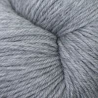 Close-up of skein of pale heathered grey yarn