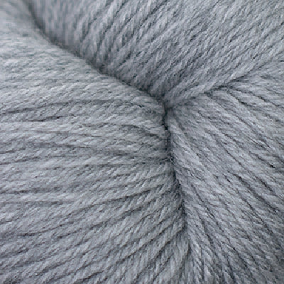 Close-up of skein of pale heathered grey yarn