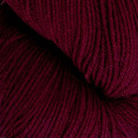 Close-up of skein of burgundy yarn