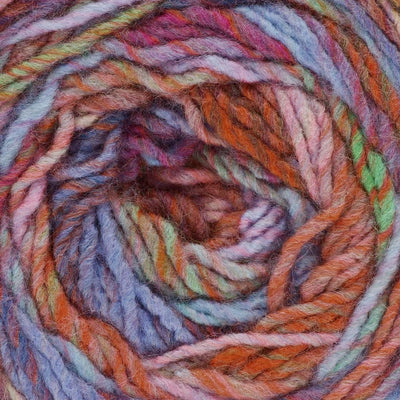 close up of multicoloured yarn in shades of blue, orange, green, and pink