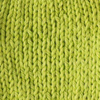 Close-up of acid green knitted fabric 