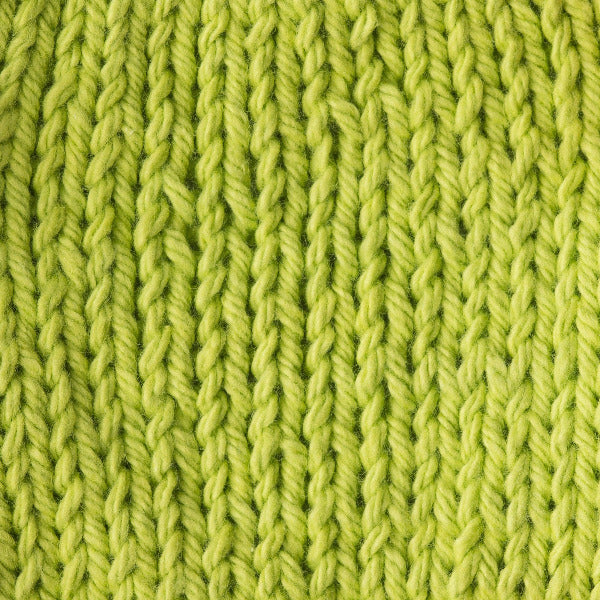 Close-up of acid green knitted fabric 