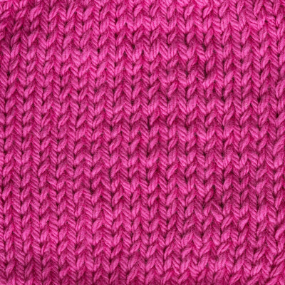 Close-up of a hot pink knitted fabric 