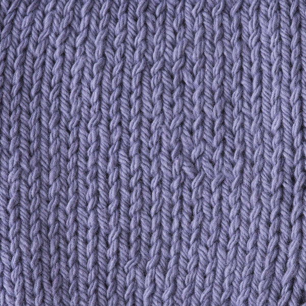 Close-up of a purple knitted fabric 