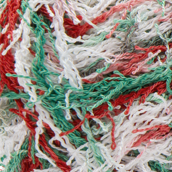 Close up of textured red, white, and green yarn 