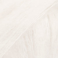 Close-up of pale cream lace yarn