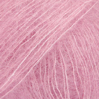 Close-up of pale pink lace yarn