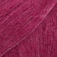 Close-up of dark rose lace yarn
