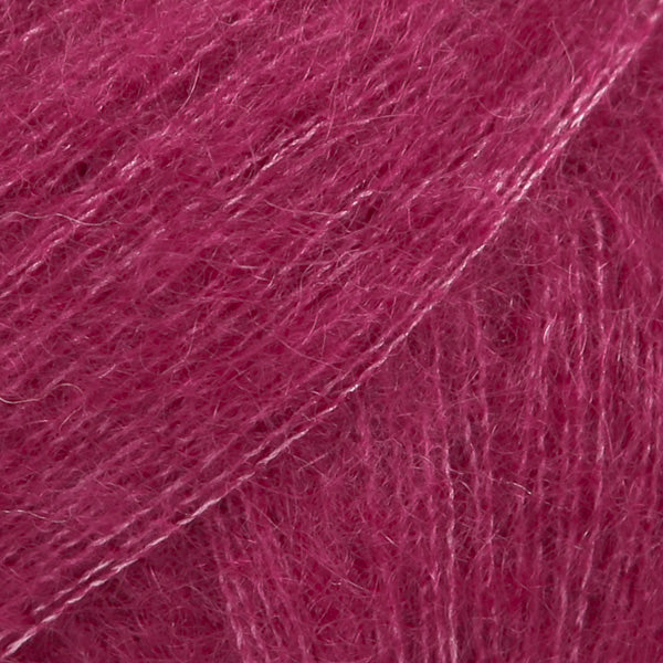 Close-up of dark rose lace yarn