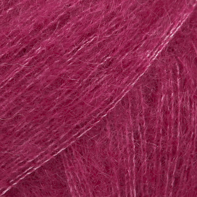 Close-up of dark rose lace yarn