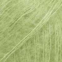 Close-up of yellow green lace yarn