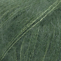 Close-up of pine green lace yarn