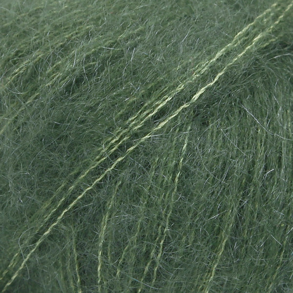 Close-up of pine green lace yarn