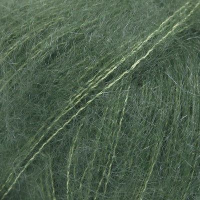 Close-up of pine green lace yarn