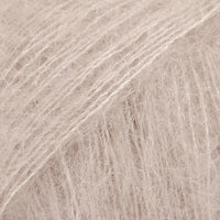 Close-up of pale beige lace yarn