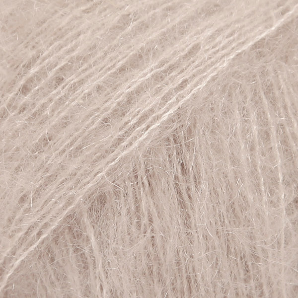 Close-up of pale beige lace yarn
