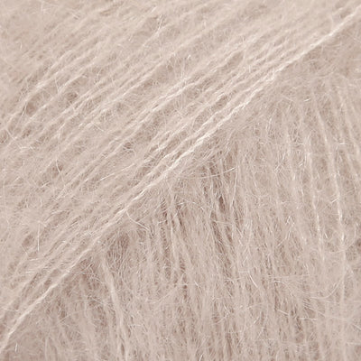 Close-up of pale beige lace yarn