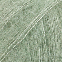 Close-up of sage green lace yarn