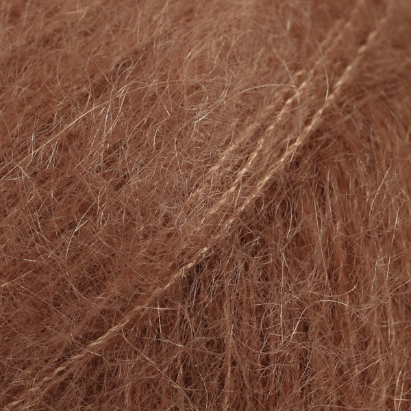 Close-up of reddish brown lace yarn