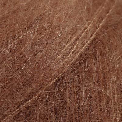 Close-up of reddish brown lace yarn