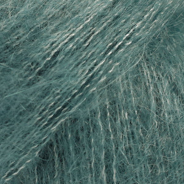 Close-up of light teal coloured lace yarn