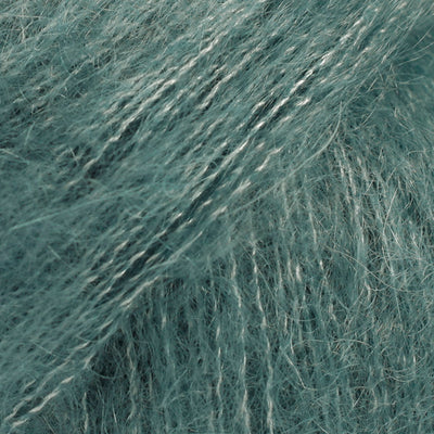 Close-up of light teal coloured lace yarn