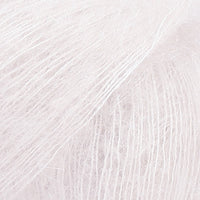 Close-up of white lace yarn