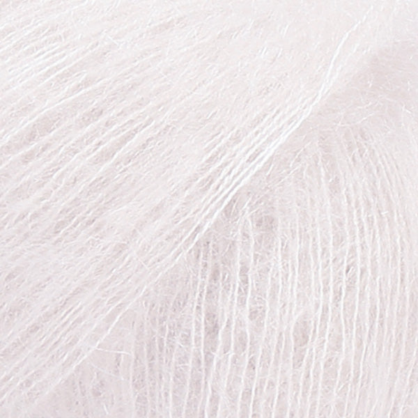 Close-up of white lace yarn