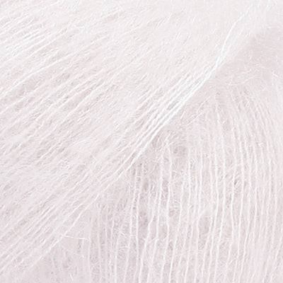 Close-up of white lace yarn