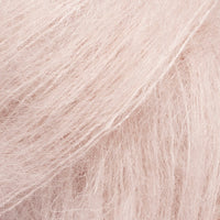 Close-up of very pale pinkish beige  lace yarn