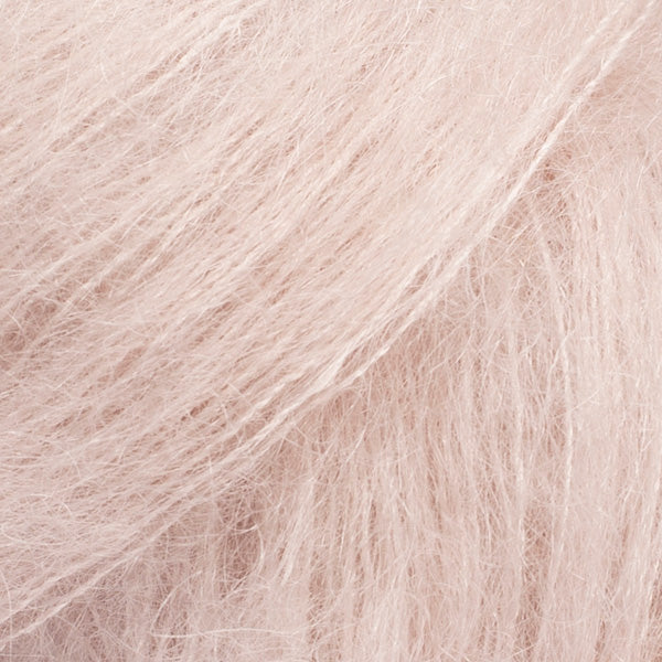 Close-up of very pale pinkish beige  lace yarn