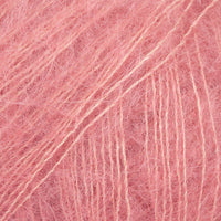 Close-up of peachy pink lace yarn