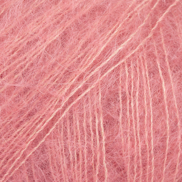Close-up of peachy pink lace yarn