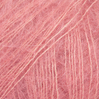 Close-up of peachy pink lace yarn