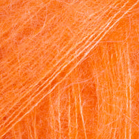 Close-up of hot orange lace yarn