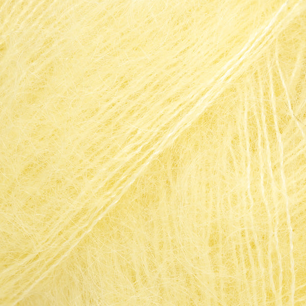 Close-up of pale yellow lace yarn
