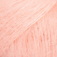 Close-up of pale peach lace yarn