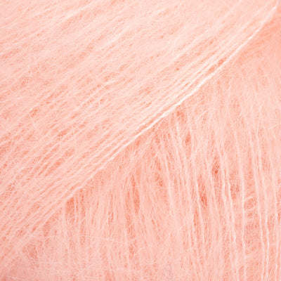 Close-up of pale peach lace yarn