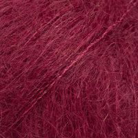 Close-up of dark red lace yarn