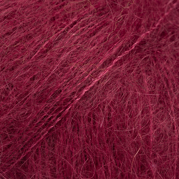 Close-up of dark red lace yarn