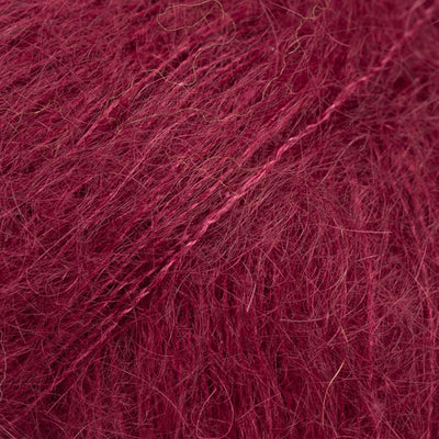 Close-up of dark red lace yarn