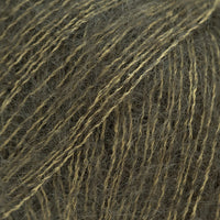 Close-up of dark olive green lace yarn