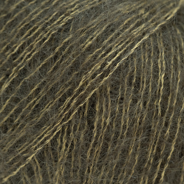 Close-up of dark olive green lace yarn