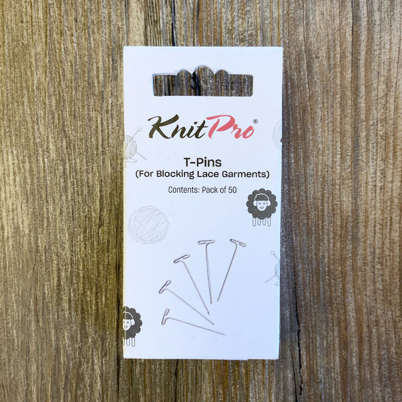 KnitPro T-Pins packaging on a wooden surface